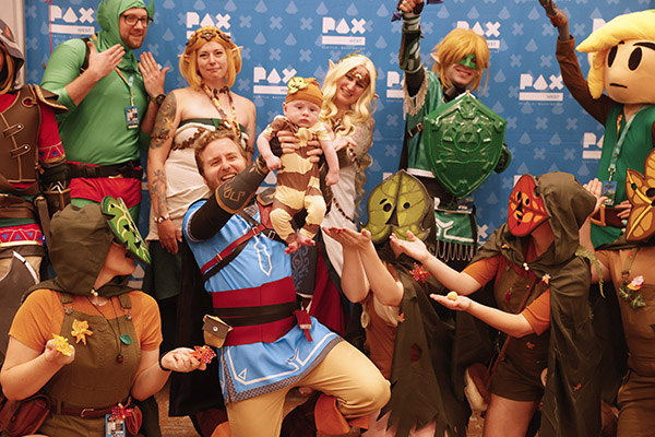 PAX West
                            Zelda cosplayers holding a child Korok